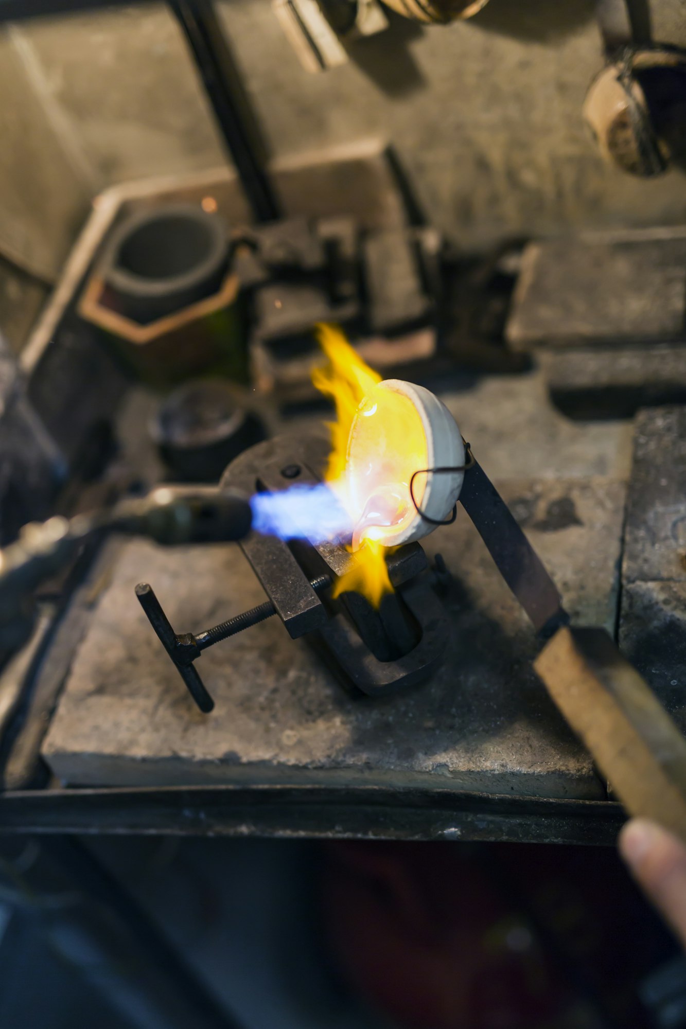 Jeweler welding gold